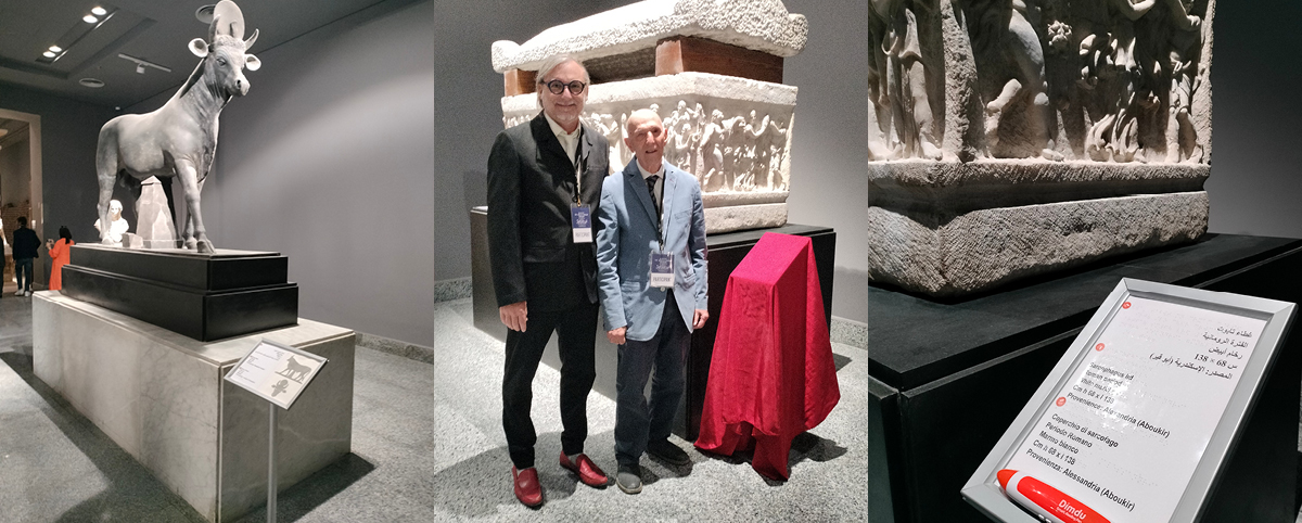 Andrea Socrati and Aldo Grassini near, a sculpture with Braille captions in multiple languages.